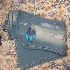 Bootcut jeans with lots of distressing on the legs, nwt,curvy